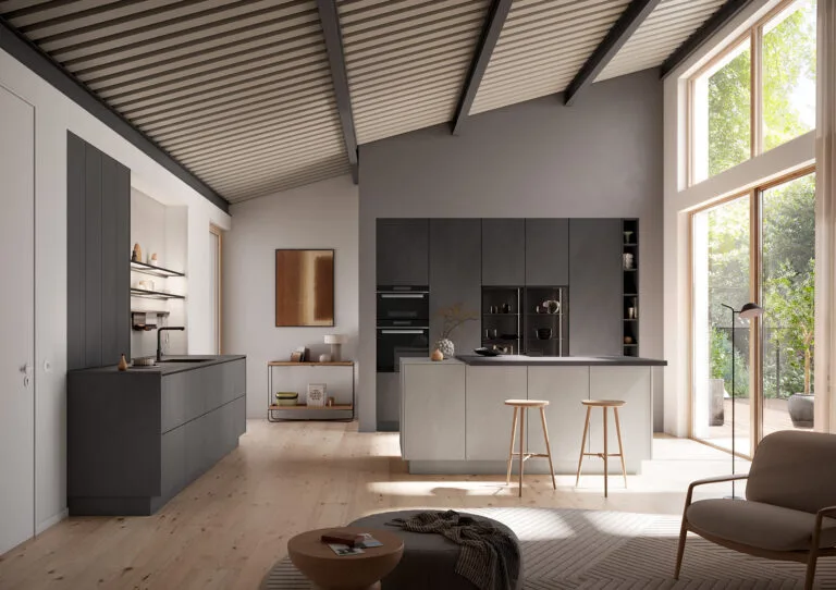 Cocina de diseño alemán con frente en cemento gris oscuro de Per Sé Küchen